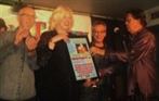 Pete Otis applauds as Cathy Young is honoured in Oct. 2012