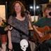 Robbie Belmore has Colleen McCullough and Kevin Bell's attention as he speaks during a gig with them in 2011 -Gary 17