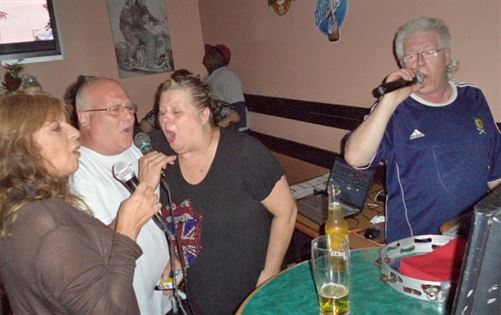 Carol and Rob join in with a couple at one of their shows. -Gary 17