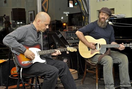 Dave Montrose joins Michael Keith [right] at Revolucion open mic. -Mary Elizabeth Armstrong, © 2015