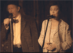 Screen capture from "The Ballad of Hugh Oliver" of Hugh with Mary Margaret O'Hara.