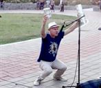 Mark Sepic showing the crowd his improvised drums at July 18 '18 concert. -GARY 17